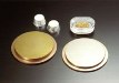 Solder gold alloys are used for connecting metallic surfaces by using a melt, which reacts with both surfaces to be joined and forms a bond following solidification.