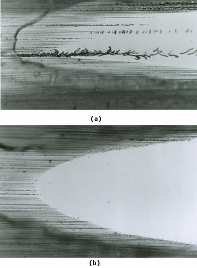 AZoJomo - The AZO Journal of Materials Online - Taper section showing ground edge of silicon wafer a) localised microcracking  b) damage free grinding.