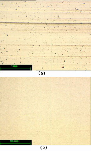 AZoJomo - The AZO Journal of Materials Online - Surface appearance of Spectrosil 2000 a) resin bond diamond wheel, b) cast iron bond diamond wheel with ELID(over 30 times higher material removal rate compared with Fig.13a).