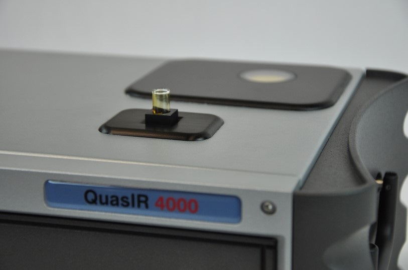 Sugarcane juice in glass vial analyzed with QuasIR™ 4000 sample compartment.