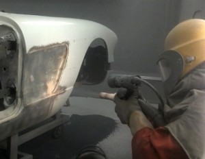 Plastic media blasting for automotive restoration.