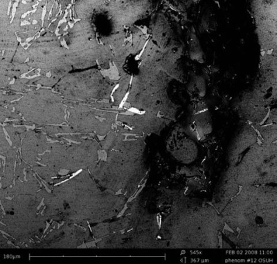 Intermetallics and porosity of an automotive Al alloy