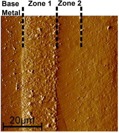 SPM image of the cross-sectioned sample surface showing the bond coat layers that were characterized. Images are collected with the same probe tip used to perform the tests, permitting very precise test positioning.