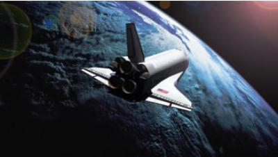 The Space Shuttle Atlantis in orbit around the earth on its final mission in July 2011.