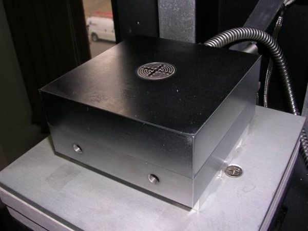Reusable dielectric/conductivity sensor embedded in press platen