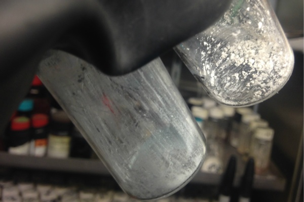 Binding increases the solubility of the neodymium over that of the dysprosium, allowing the former to be filtered off.