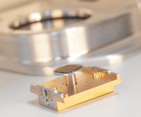 The K-Alpha sample holder fitted with the 3 cm diameter rotating stage for depth profiling
