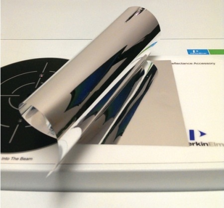 A rolled sheet of enhanced specular reflector (ESR) polymer film.