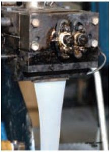 Intimate mixing of polymers by Readco Extruder equipped with vertical sheet die