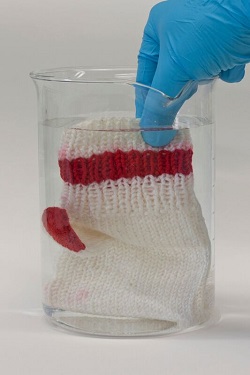 The yarn is treated so that the gelatin does not dissolve in water