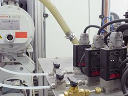 A vacuum pump and three mass flow controllers for prototyping.