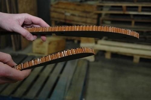 These 0.5” carbon composite parts were cut at 55,000 psi utilizing a .010/.030 orifice nozzle combination and 0.5 pounds of garnet per minute