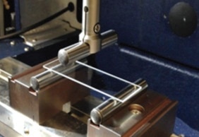 3-point bend fixture for glass testing.