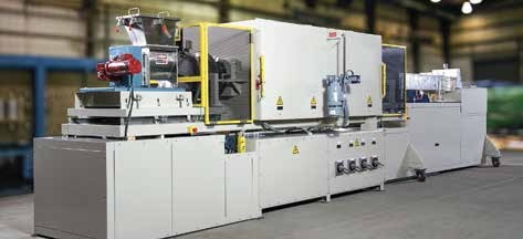 Mesh belt/rotary thermal combination system designed for a national laboratory with space constraints.
