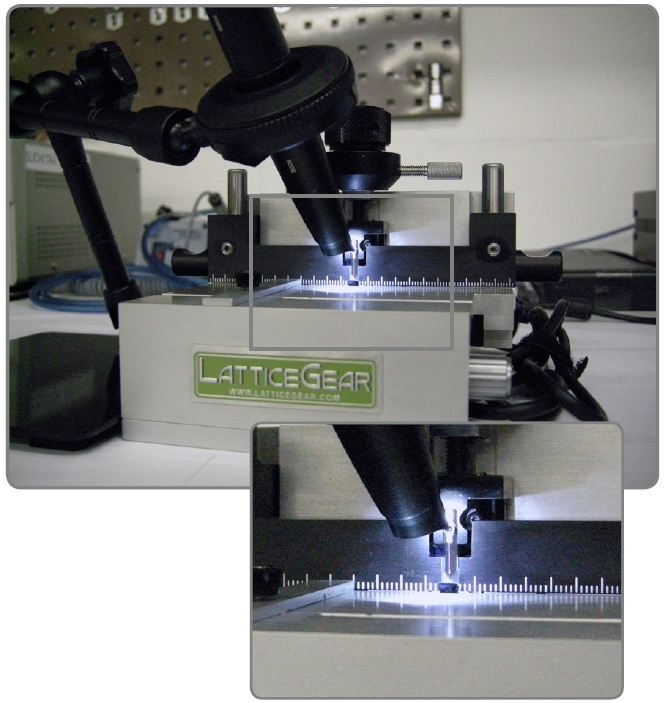 The SmB6 sample is approximately 4 mm in width and 1 mm in height, with both cleaved [001] planes. It is sliced from the ingot; the curved side is the perimeter of the ingot. Using the optical microscope and computer display, it is possible to confirm the shape and dimension for the slice of the material.