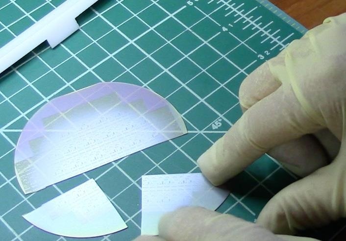 Sapphire wafer after cleaving perpendicular and parallel to the flat.