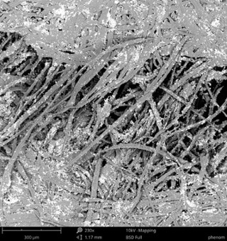 SEM images of a strip of paper being stretched using the tensile stage.