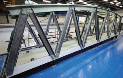 Hybrid Bridge Systems with FRP Structures