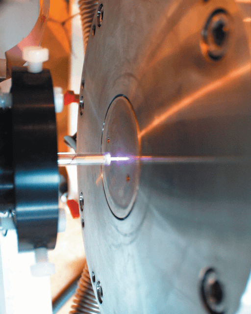 Atmospheric plasma produced between the RF electrode, or needle, and the sampling orifice of the Hiden Molecular Beam Mass Spectrometer.