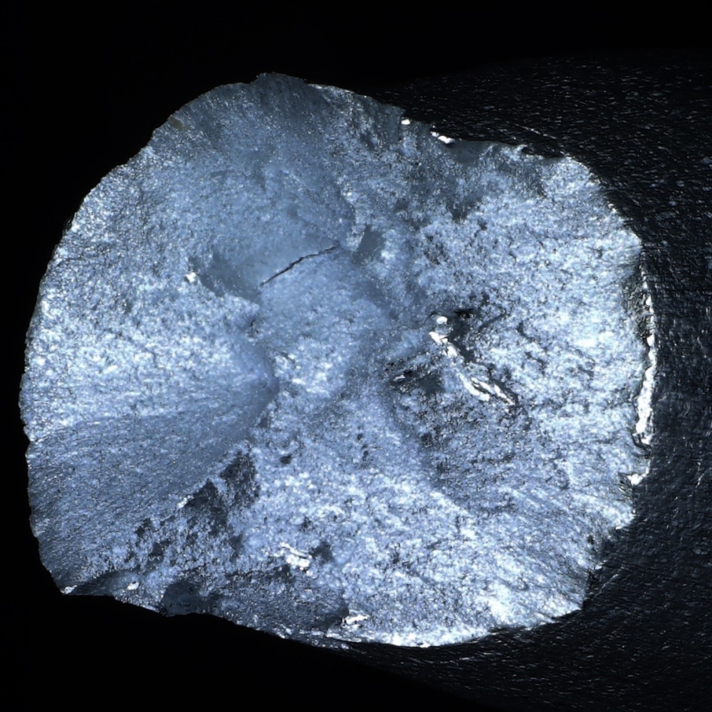 A fractured metal component taken on a DSX 110