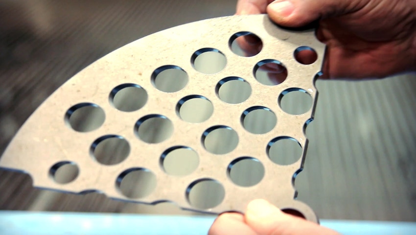 The Jet Edge X-5 5-axis system has the ability to cut steel plates as thick as 6 inches and alloy plates as thick as 3 inches.