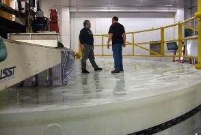 The 8.4 Meter Mirror in the Polishing Cell