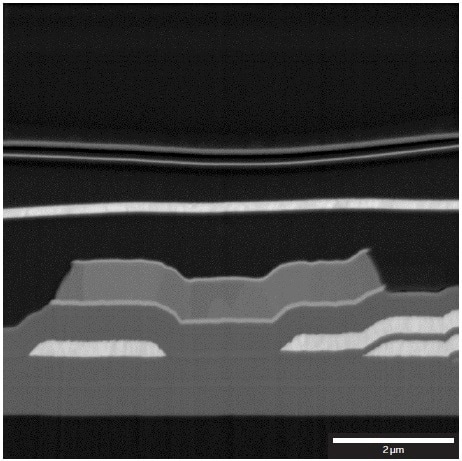 Detailed image of the Al contacts and SiO2/SiNx layer structure. Mid-Angle BSE detector at 2?kV.