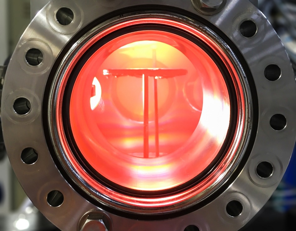 Inside vacuum chamber doing the sputtering to fabricate thin film technology.
