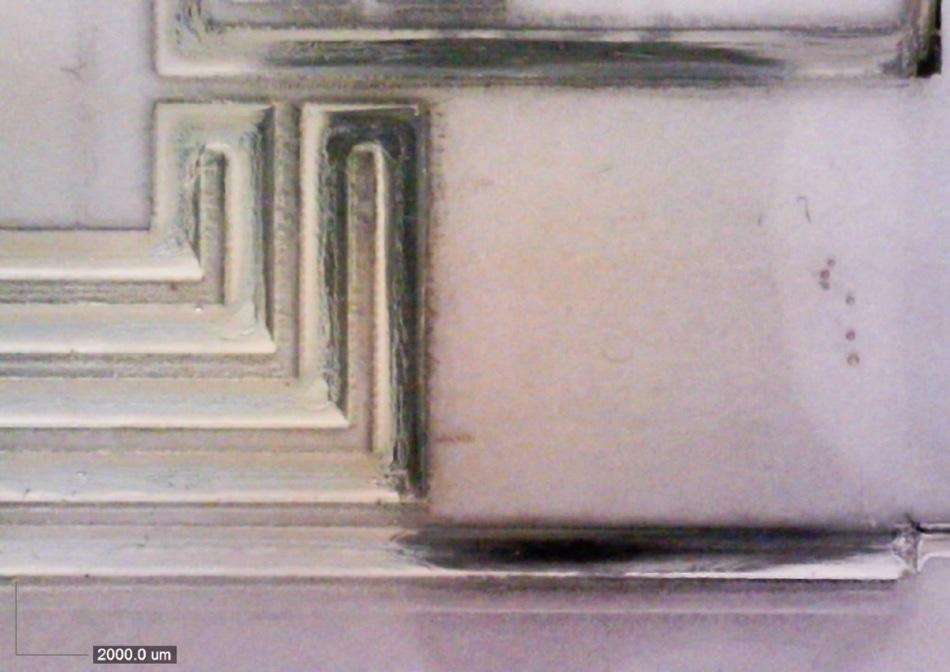 Detail of the antenna mold filled with silver ink to build up the antenna.