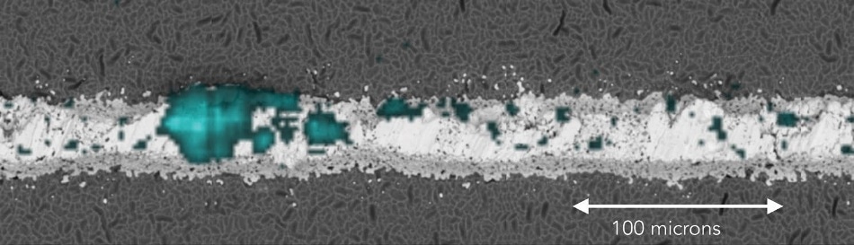 Segment of the Te map overlaid on the micrograph showing one Te inclusion.