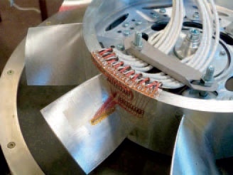 Fan blade with strain gages in complete fan.