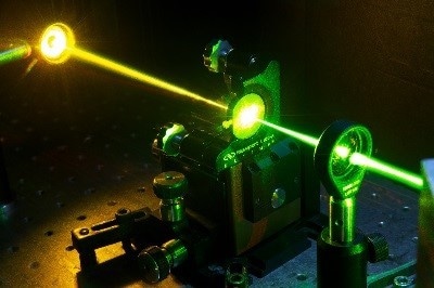Image showing a diamond Raman laser converting green to yellow light.
