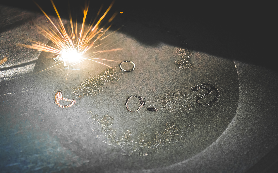 Laser sintering machine for metal. Metal is sintered under the action of laser into desired shape in working chamber