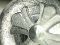 Screw head design with logo and driver functionality.