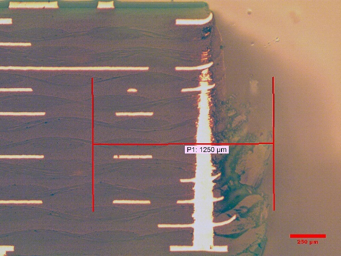 Damage from punch and die sectioning.