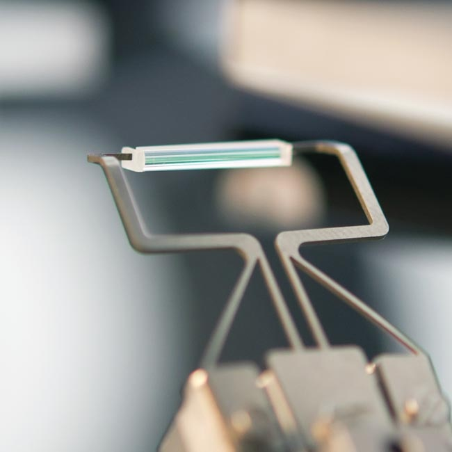 Photonics Testing and Assembly Using Mechatronic Technology