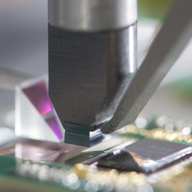 Photonics Testing and Assembly Using Mechatronic Technology