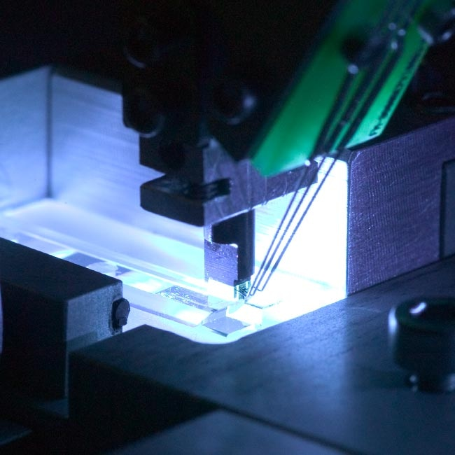 Photonics Testing and Assembly Using Mechatronic Technology