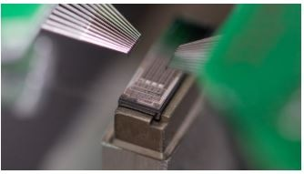 Photonics Testing and Assembly Using Mechatronic Technology