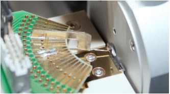 Photonics Testing and Assembly Using Mechatronic Technology