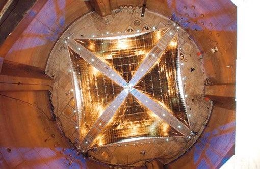 Deployed 20- meter solar sail on vacuum chamber floor.