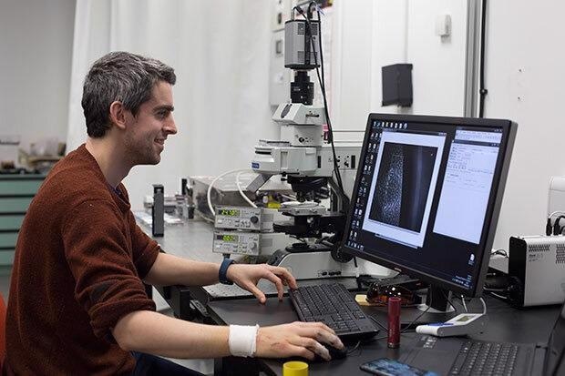 Dr Finlay Walton working on the system with the Linkam THMS600 at the University of Glasgow.
