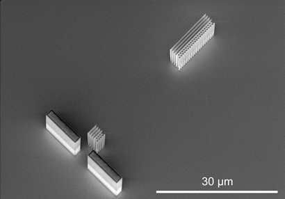 A two-stage silicon accelerator device fabricated by electron beam lithography and inductively coupled plasma reactive ion etching (ICP-RIE).