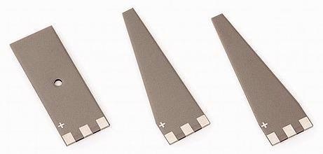 Piezo bender actuators with variable contours: flexibility geometries maintaining the full ceramic encapsulation while requiring very low operating voltages of only +/-30V.