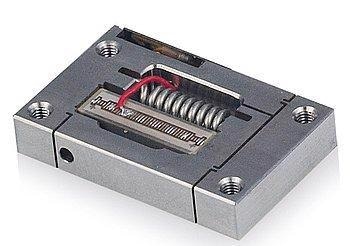 Low-cost piezo flexure amplified actuators for OEM application. The image shows the integrated piezo stack actuator and the preload. A position feedback sensor is optional.
