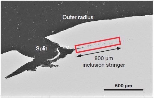 Backscattered electron image of the split. Highlighted area is the inclusion stringer that started at the base of the split (Acc voltage 15 keV, beam current 0.22 nA).