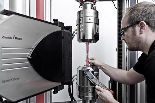 ZwickRoell laserXtens non-contact extensometer operating without specimen marks.