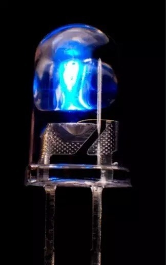 A blue LED, made possible by the alloy indium gallium nitride.
