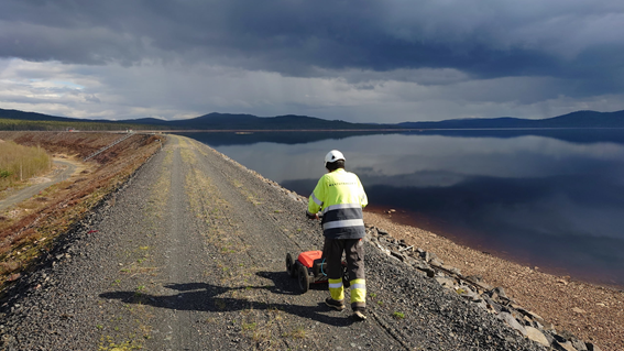 Inspecting an earthen dam