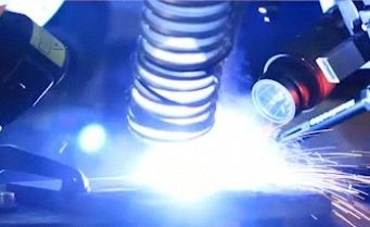 Typical setup in welding and additive manufacturing research shows* high-speed camera on the right with laser illumination on the left.